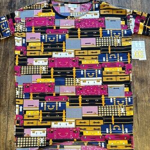 LuLaRoe Irma Multicolor Luggage Print Top